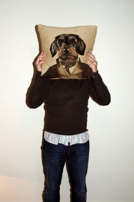 Man with Dog Face - Funny photo of man with a dog face. The dog face is printed on a pillow, look cute and fun.