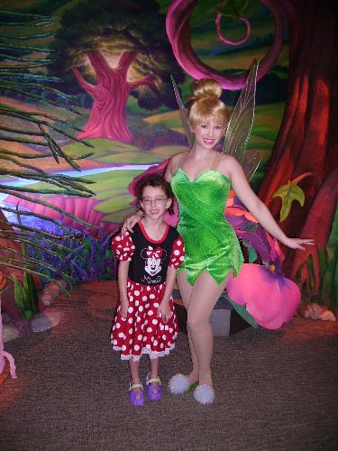 disney world - my daughter with a fairy at disney world