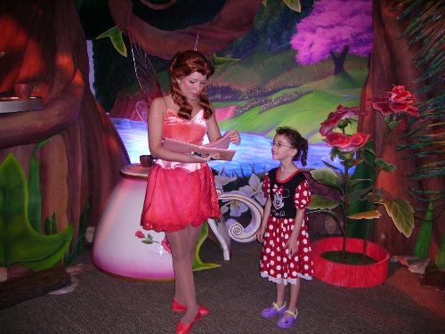 disney world - my daughter with a fairy at disney world