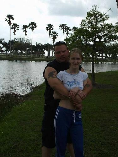 me and my fiance - This is the area id love to get married at.. palm trees and water... oh yea and blue skies!=]