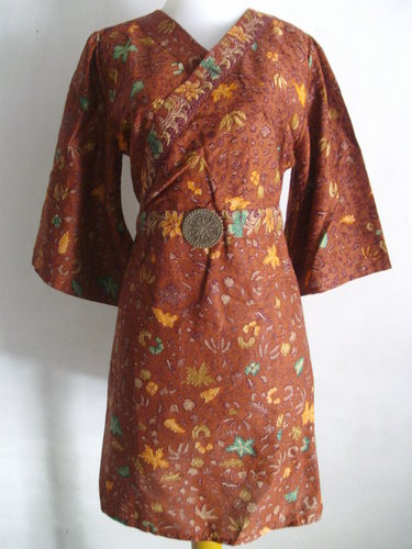 batik - batik is traditional fabric from Indonesia. It is very common to use in formal occasion such as wedding day, national independence day, ect.