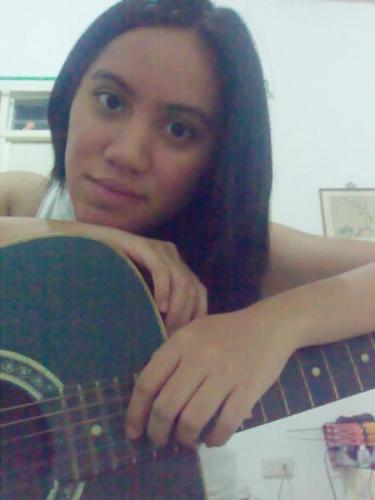 me and my guitar - my first guitar..my mom bought it for me when i was in 3rd year high school..