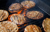 Grilling - Hamburgers cooking on a BBQ grill