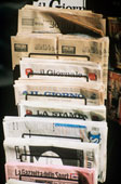 Newspapers - Nwspaper rack in an office