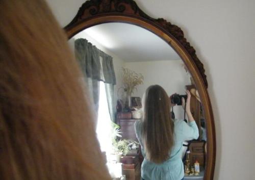 Back of My Head - How often do we intentionally have the back of our head photographed? This is my hair as of January '09. I'm thinking about chopping it off. Any thoughts?