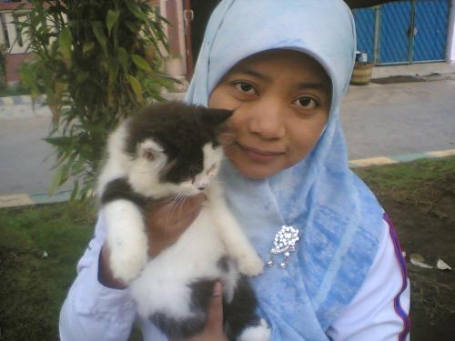 Mine - me and my cat, yasmin, in front of my home