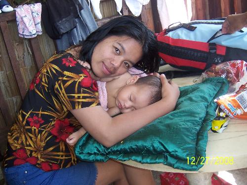 Me and my wonderful baby Gideon - This picture was taken just last December 27, 2008 taken in River View, Asin, Baguio city, Philippines. I really like this picture as this represents how much i love my son. Ever since i had him, i came to appreciate how great life is with having a baby. Whenever i come home from work or from school and sees him smiling at me, i feel all my tiredness fade instantly. I love you Gideon!:)