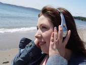 Hearing - Lady listening with headphones