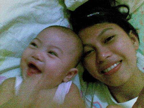 A happy bonding - This is one of the picture that i have together with my daughter kleyr, shes 5mos old at that time but right now shes already 1 yr older..I hope that someday she will become a good person and achieve her goal in life with a fear in GOd