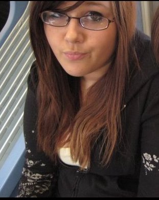 light rail pic? - me on the light rail. i don't quite remember why they took this picture or why my face looks like that. but oh well.
