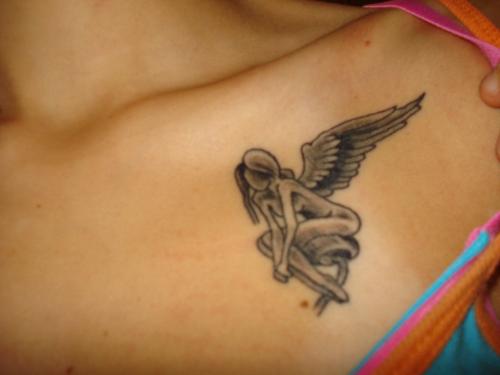 My tattoo - My mom has the angel's missing wing as her part of our tattoo.