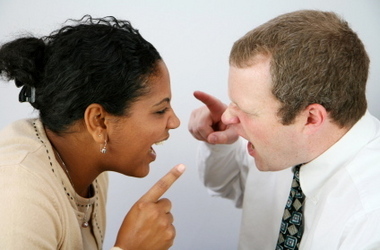 talking politics - a girl is talking politics with her workmates.