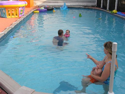 My pool - My daughter and son in law and my grandchildren