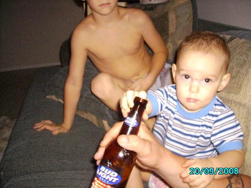 What is the drinking age again? - As sitting on the couch little guy decided to try and take a drink