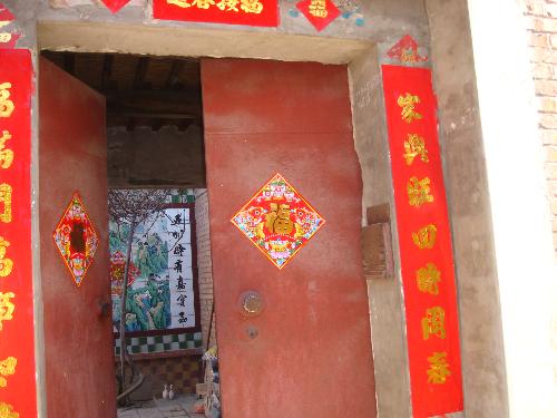 gate - It's my grandparents' house.They live in the countryside,and they lived a leisure life.During the Spring Festival,we went to visit them.Very happy to see my loving grandparents.
