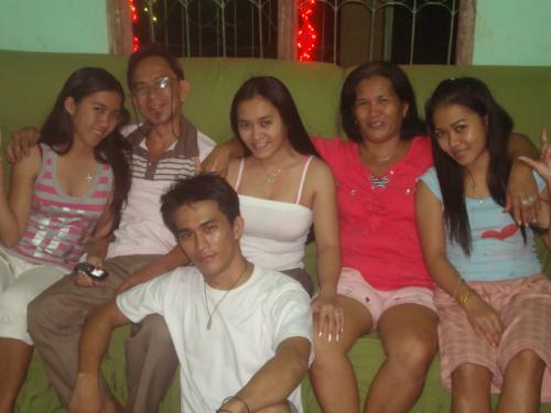 The Lopez Family - This was taken during Christmas. Imagine that, we were complete on the Christmas. God knows how happy we were.