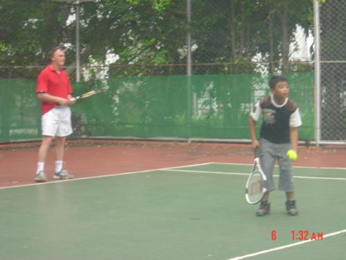 Playing Tennis in the Rain - Playing tennis in the rain