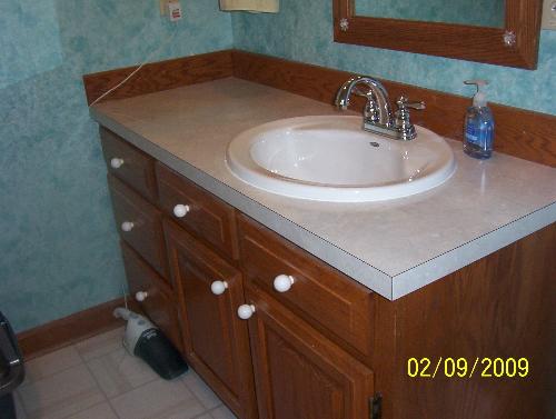 Our New Bathroom Counter Top - sink and fawcet! They're beautiful!!