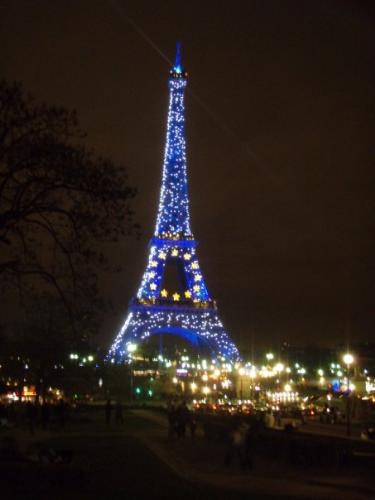 Eiffel Tower Sparkling - The eiffel tower lights up blue at night and on the hour every hour between certain times it sparkles all over!