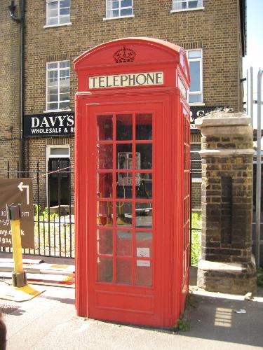 Phone Box - A red phone box that used to be everywhere in London. There are still some about in London This one is in Greenwich. Phone Box - A red phone box that used to be everywhere in London. There are still some about in London This one is in Greenwich.