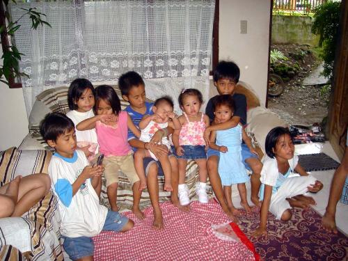 Christmas Vacation - A crowded picture of children. These are my hubbies nieces and nephews. Every Christmas vacation, the kids would gather on my mother-in-laws house to wait for their gifts from their uncles and aunties. :)