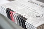 News - Stack of newspapers from a machine