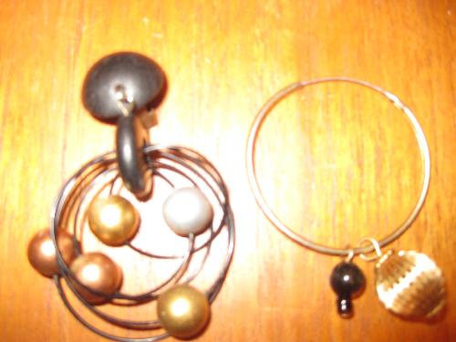 earrings - these are two of my favorite earrings. The first one is a clip on dangling and the other one is a hoop.