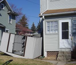 Shed blew into the side of my house - The wind blew the shed into the air and slammed it into my house. Shed blew into the side of my house - The wind blew the shed into the air and slammed it into my house.