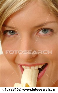 Eating a Banana! - Woman enjoying eating a banana