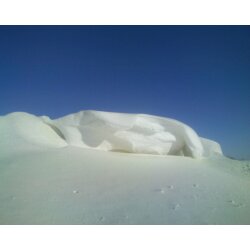 Blue Sky White Snow Scupture - The hubs has a good eye don't you think? He took this of a snowbank over 8 feet high.