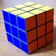 rubik's cube - The Rubik's Cube is a 3-D mechanical puzzle invented in 1974[1] by Hungarian sculptor and professor of architecture Erno Rubik. Originally called the 'Magic Cube',[2] the puzzle was licensed by Rubik to be sold by Ideal Toys in 1980[3] and won the German Game of the Year special award for Best Puzzle that year. As of January 2009, 350 million cubes have sold worldwide[4][5] making it the world's top-selling puzzle game.[6][7] It is widely considered to be the world's best-selling toy.[8]