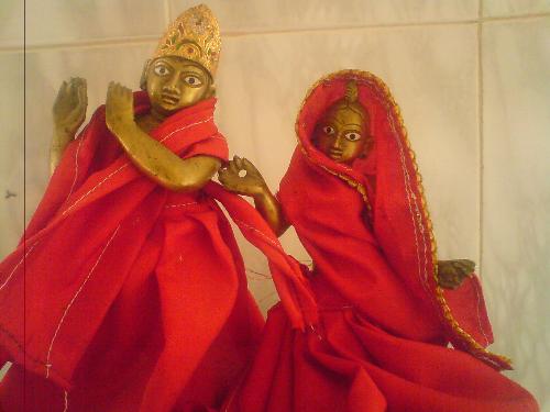 God - These are the God and Godess i have in my prayer room.They are made of eight metals.Krisna and his beloved Radha