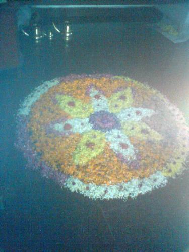 Flower carpet - Flower carpet is laid on the day keralites celebrate onam to greet their king mahabale who is believed to come from heaven to see his people.This the flower carpet we laid on onam 2008.