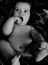 uh oh - this is him at 6 months as well.. my friend thats a photographer took these.