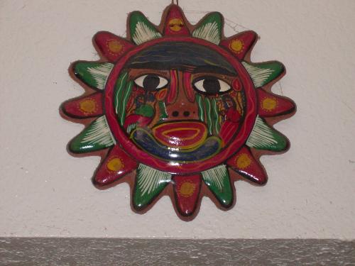 Mexican Sun Art - This is Mexican Art in the shape of the sun. I brought this home from a trip to Cancun.