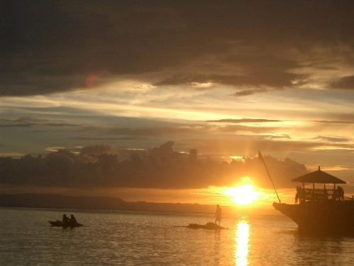 Sunset at Camotes Island - The picture was taken when I went went my family in an island of Cebu. This is the sunset at Mangudlong Beach Resort.