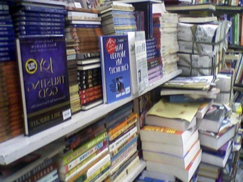 Books and more books - It's a pile of books on a book sale store. Too many to choose from.