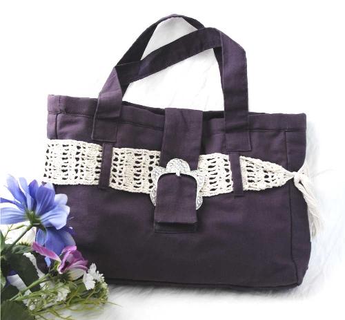 Handmade purse with rhinestone buckle and crochet  - I made this purse with a shiny purple fabric. I attached a rhinestone buckle and a crocheted belt...lovely!
