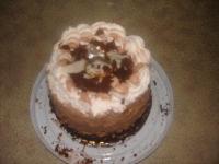chocolate cake - this cake is the important cake that my friend receives last year. can you see whats on the top? yeah, its the engagement ring she receives from her boyfriend.. and this year is their wedding.