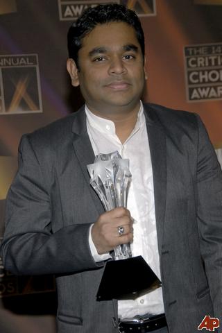 Moments of Glory! - A.R.Rahman poses with the best composer actor award for 'Slumdog Millionaire' at the 14th Annual Critics'Choice Awards in Santa Monica,Calif.It may have taken three Oscar nods and a Golden Globe for American audiences to notice A.R.Rahman,but in India,the 'Slumdog' music composer has been a national treasure.