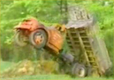 Nose in the air - A dump truck with it's nose in the air after a little mishap.