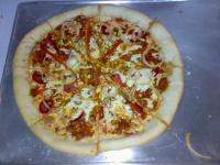homemade pizza - im proud to say that it is a homemade pizza. my mother make it. and its so delicious.