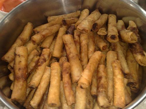 eating food - lumpiang shanghai