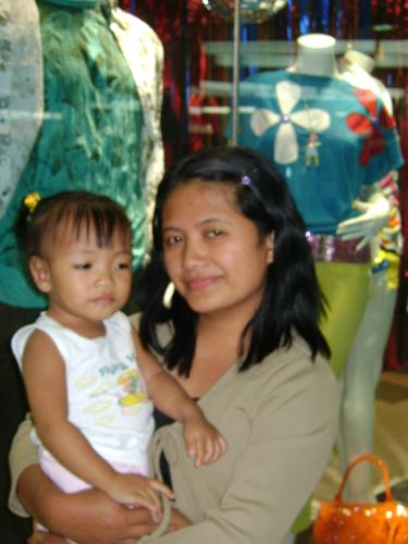 Me and Baby Maimai - This photo was taken when we were in Cebu City last September, 2008. I was attending a seminar and since i am still breastfeeding her, I had to bring her and my mother in-law who is taking care of her when i am at work.