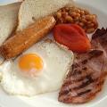 Breakfast - The Most Important Meal of the Day - Egg, hotdog, bread, bacon, beans and others.