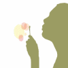 blowing bubbles - woman blowing bubbles