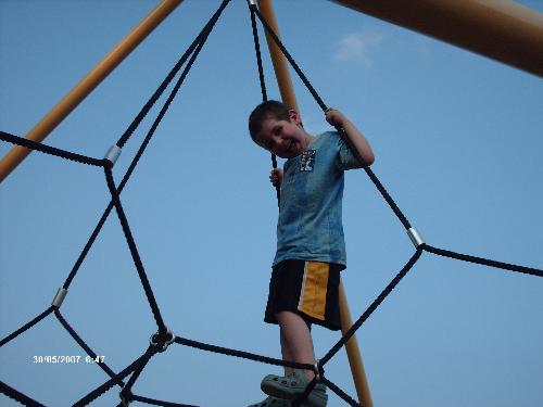 My son playing at the park - Playing at the park.