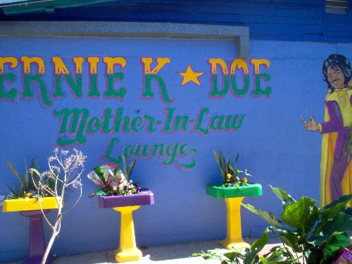 Mother in law lounge - This is a picture of one of the walls outside of the mother in law lounge showing a bit of a likeness of Ernie K Doe and some interest use of recycled pedestal sinks.