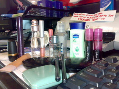 my make-up set :) - actually that's the one i used for my day to day activity and here in the Phils. we call it 'kikay kit'  it has: (avon and maybeline products) blush ons cheek tint  lipgloss lipsticks - which i frequently use :D curlash eyeliner powder set of tweezer, nail cutter etc hand sanitizer lotion perfume/cologne  did i miss anything? lol
