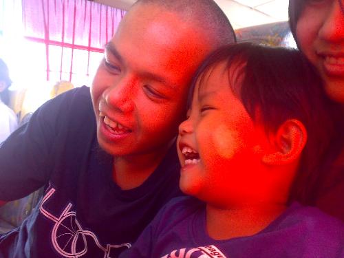 my son and my hubby during a trip on a bus :) - this photo taken when we visited my family  we don't have a service that's why we decided to commute (which we are used to do if we don't have a car :D) i just love the bonding moments of my son and hubby so nice looking in this photo   Godabless!0=)